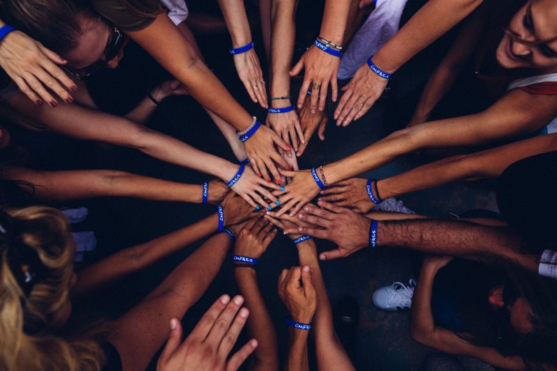 group of people huddling